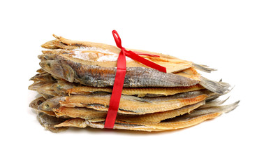 Wall Mural - Dried salted fishes on white background