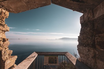 Poster - Mesmerizing view from the balcony of Sandsfoot castle looking at Portland in the distance