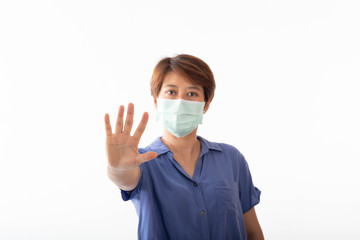 Asia woman aseptic medical mask protected on her face, hands, stopped without signs. Air pollution, viruses, the concept of the pandemic of coronavirus