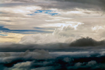 Wall Mural - Flying above the clouds. view from the airplane