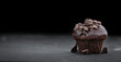 © HandmadePictures - Fresh made Chocolate Muffins on a slate slab (close-up shot; selective focus)