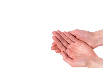 Woman holds hands out on white background from the side