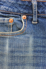 Sticker - Jeans front pocket view, light blue fabric design with metal rivet and seams. Casual jean clothes detail, men's and women's bottoms close up vertical top view