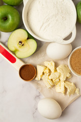 Wall Mural - ingredients for apple pie on a white background top view close-up
