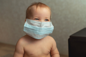 Coronavirus. A little child is wearing a medical mask. Stay home. Quarantine Isolation