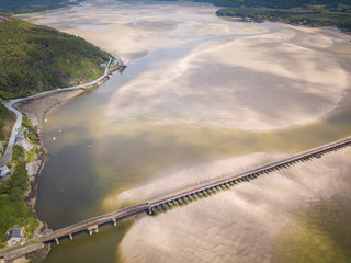 Wall Mural - Aerial view of Barmouth Bridge and Afon Mawddach Estuary, Snowdonia, Wales, UK