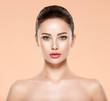 © Valua Vitaly - Portrait of beautiful young brunette woman with clean face. Closeup face of young adult woman with clean fresh skin.