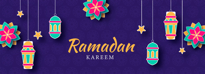 Wall Mural - Islamic Holy Month of Ramadan Banner with Colorful Illuminating Lanterns, and Flower Patterns on Purple Textured Background.
