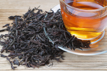 Canvas Print - Cup of tea with dried leaves