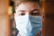 guy in a coronavirus mask, close-up. Concept of viral infection development.