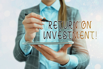 Poster - Text sign showing Return On Investment. Business photo text performance measure used evaluate efficiency of investment