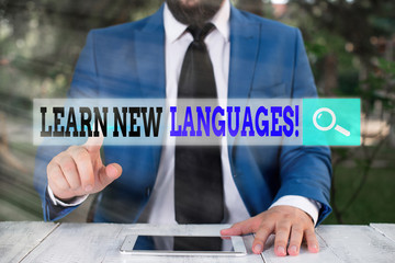 Poster - Writing note showing Learn New Languages. Business concept for developing ability to communicate in foreign language