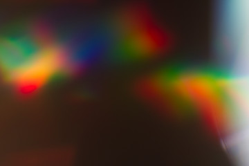 Fototapete - Light leak texture on black background.