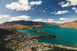 aerial view of Queenstown, New Zealand, sits on the shores of the South Island Lake Wakatipu, set against the dramatic Southern Alps. Renowned for adventure sports