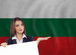 Young woman with white banner and national flag