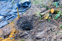 Hole Dug In Soil To Erect A Fence Post