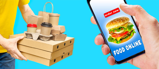 Hand holding phone with app ordering and delivery food isolated on blue background with delivery person.
