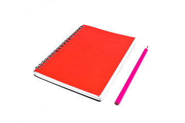 Wall Mural - Pink pencil beside a red color covered single note paper diary isolated on a white background