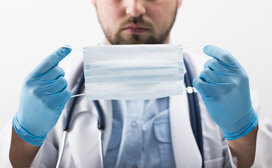 male doctor with gloves wear medical mask