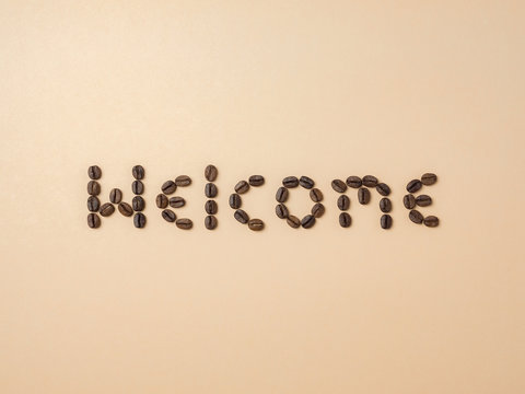 Roasted coffee beans arranged in letters