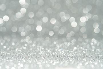 silver and white bokeh lights defocused. abstract background