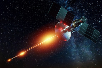 space military satellite, a weapon in space shoots a laser against the background of the earth. atta