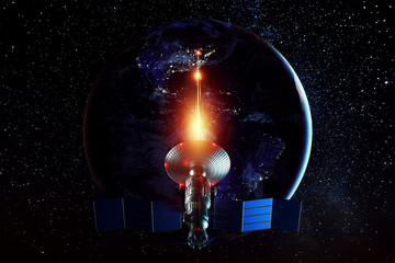 Wall Mural - space military satellite, a weapon in space shoots a laser against the background of the earth. atta