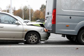 Wall Mural - Car crushed hood bumping into truck, dangerous. Call an insurance company representative. Right to recover funds from guilty driver. Passing an alcohol test. Deprivation rights or fine in court