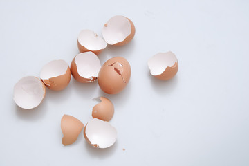 Broken egg shell on white background