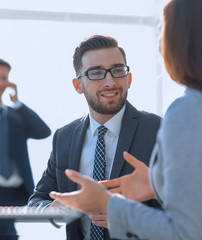 Wall Mural - Confident man talking to his interviewer during a job interview