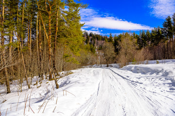 Beautiful snow-packed mountain road