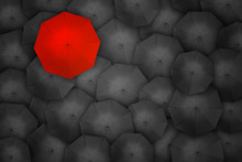 Standing Out From The Crowd, High Angle View Of Red Umbrella Over Many Dark Ones