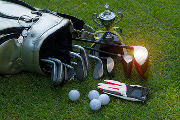 Wall Mural - Closeup old golf bags on green.