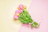 Fototapeta Tulipany - Bouquet of beautiful flowers on color background
