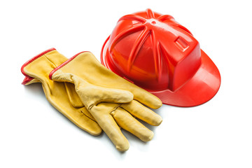 Wall Mural - construction tools yellow leather gloves and red helmet isolated on white