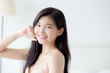 © NT_studio - Beautiful portrait young asian woman sexy in underwear figure fit relax with seductive in bedroom, beauty asia girl body slim in lingerie confident and happy stand in bedchamber, lifestyle concept.
