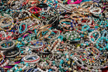 Colorful And Inexpensive Costume Jewelry At The Local Market In Rome, Italy.