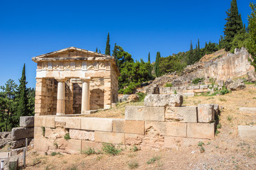 Wall Mural - Ancient city of Delphi with ruins of the temple of Apollo, the omfalos (center) of the earth, theater, arena and other buildings, Greece