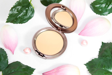 face powder with lotus flower on with background
