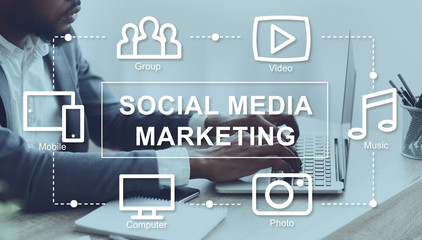 Fototapete - Social media marketing. African American businessman using laptop and SMM icons on virtual screen, collage