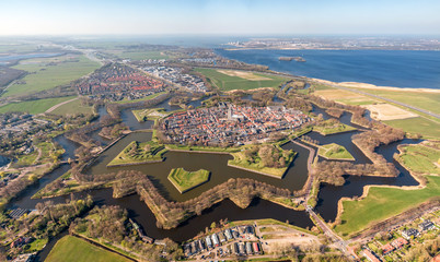 Wall Mural - Super high resolution aerial image of the medieval Naarden Fortress village in the Netherlands with defence walls and canals