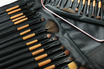 background with makeup brushes. set of professional make up brushes