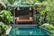© Oleg Breslavtsev - Small private swimming pool in Bali house. Green tropical plants around, wooden sofa. Villa in Jungle.