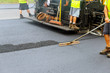 Asphalting of the road with steamroller