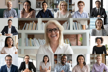 Wall Mural - webcam pc screen view during group video call, many faces diverse colleagues participating in on-lin