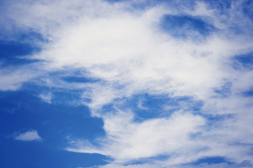 Wall Mural - blue bright sky with white clouds background