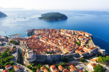 Dudrovnik, Croatia. Aerial View On The Old Town. Vacation And Adventure. Town And Sea. Top View From Drone At On The Old Castle And Azure Sea. Travel - Image