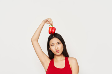 Wall Mural - young woman holding a red apple