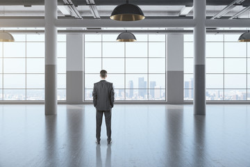 Sticker - Businessman standing in gallery interior