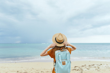 Canvas Print - young woman on the beach